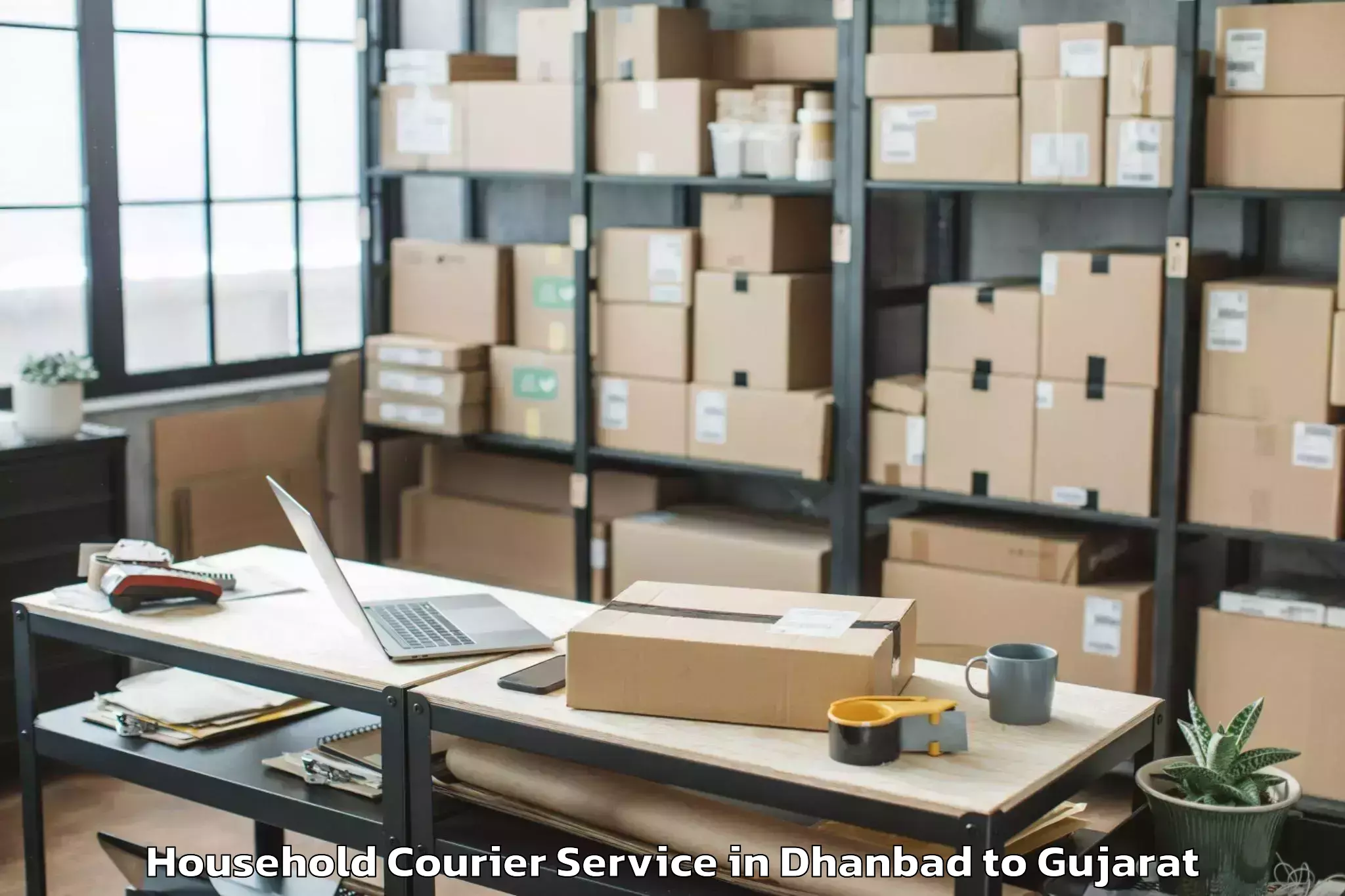 Book Your Dhanbad to Tilakwada Household Courier Today